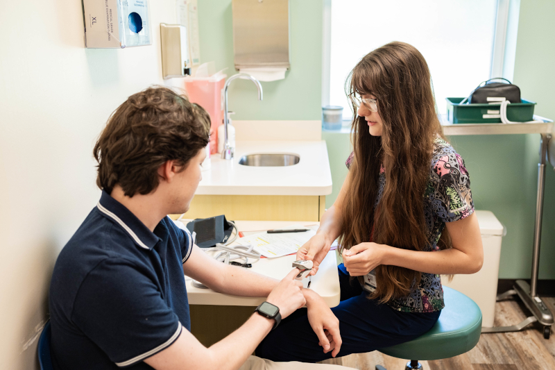Patients in conversation with a nurse